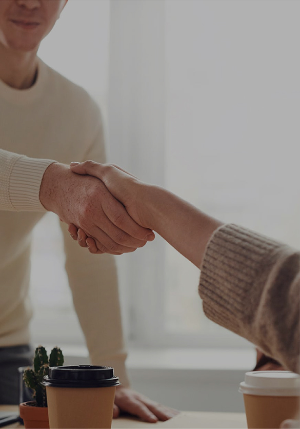Two People Shaking Hands